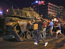 Turkey dismisses 7,400 public sector workers a year after coup attempt