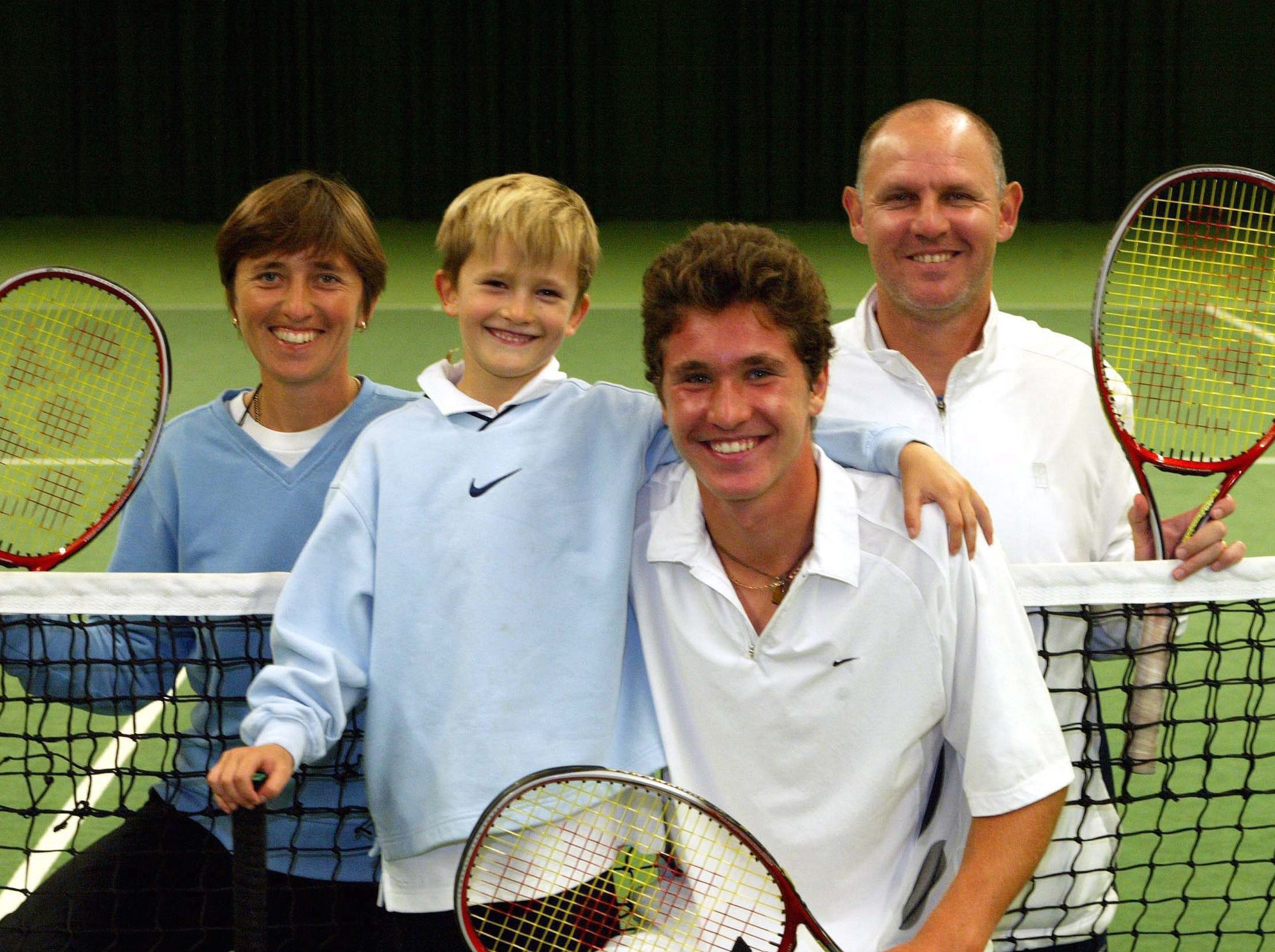 A young Zverev with his mother, father and older brother, in 2003