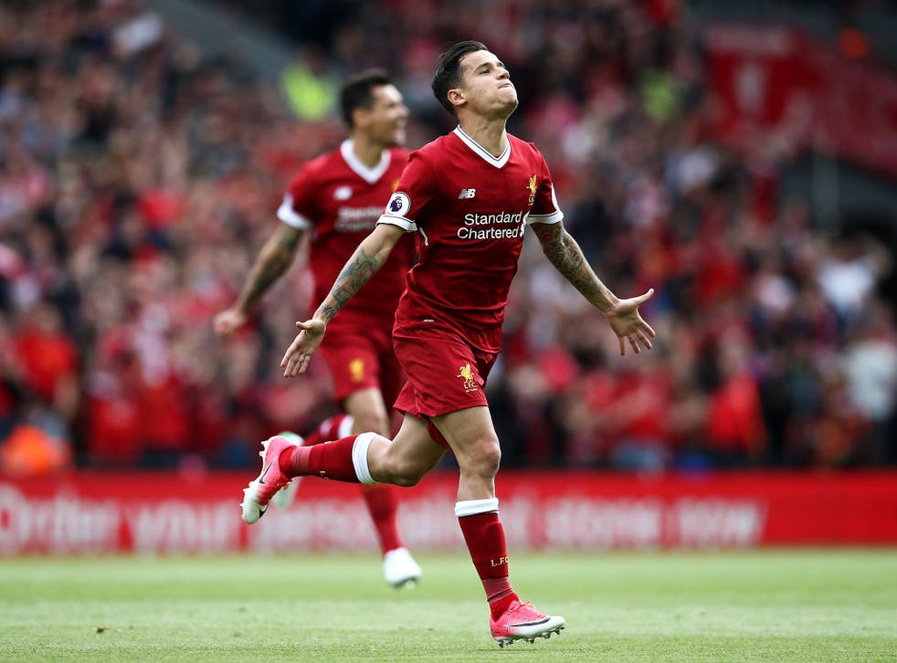 Philippe Coutinho celebrates scoring Liverpool's second in their end-of-season win against Boro