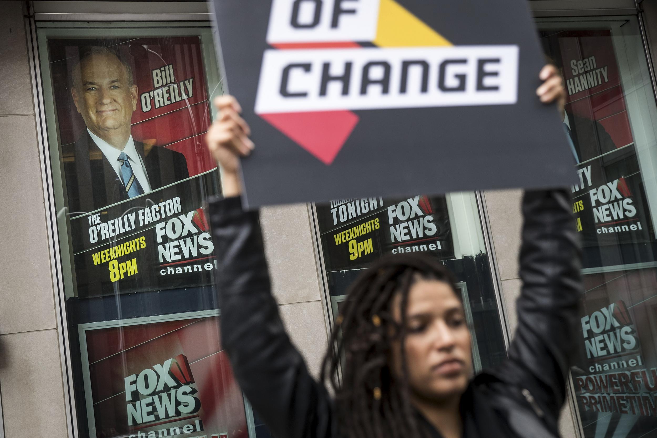 Protestors rally outside Fox News offices in New York in the wake of sexual harassment allegations