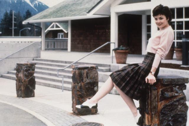 The character Audrey Horne in one of her famous skirt and sweater combos