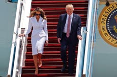 What it really means that Melania swatted Trump's hand away
