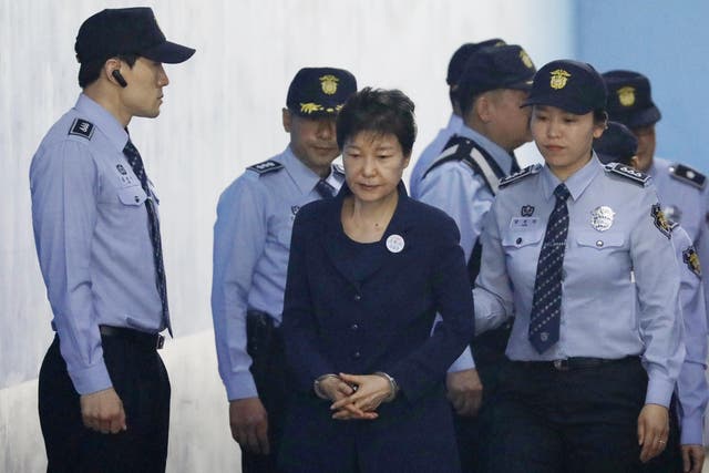 Park Geun-hye arrives at court in Seoul for the beginning of her corruption trial