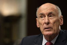US intelligence chief: Can't comment on conversations with Trump