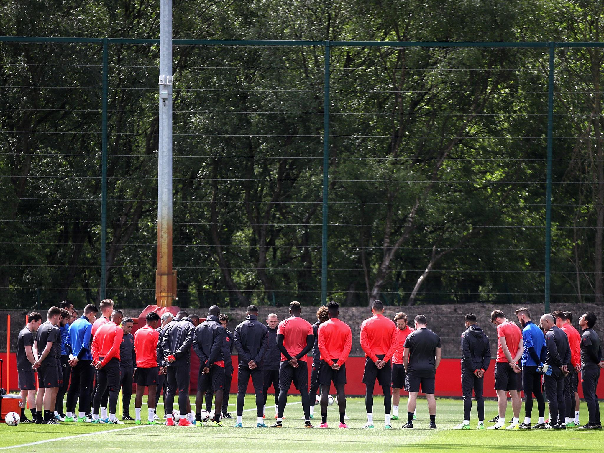 United's players held a minute's silence for the victims of the Manchester attack