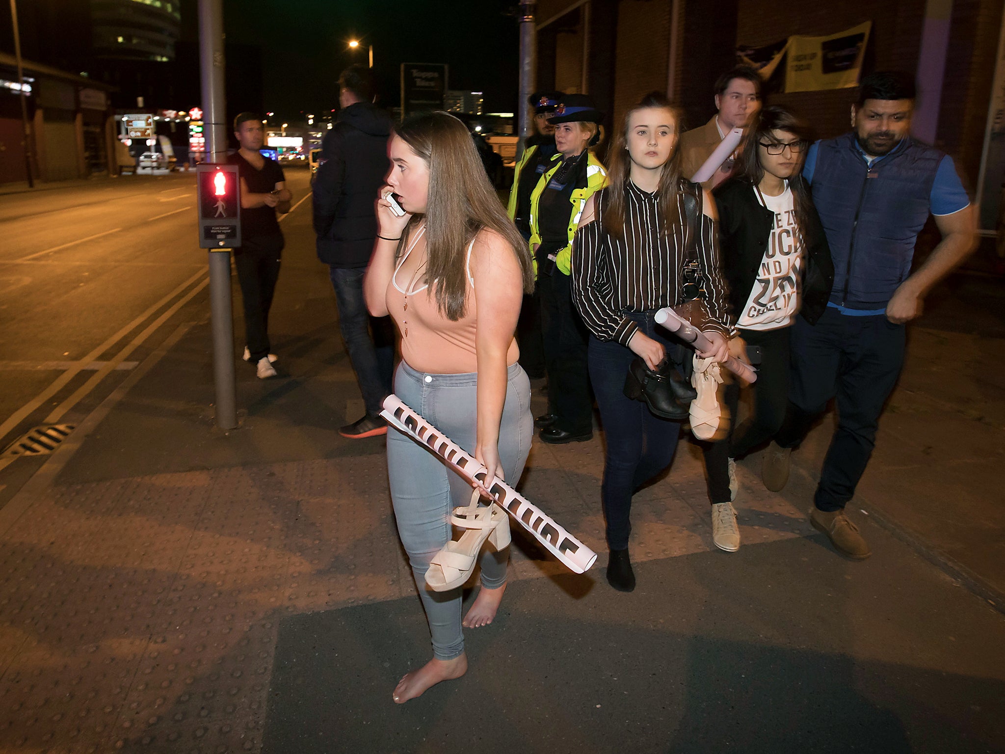 Police and fans close to the Manchester Arena