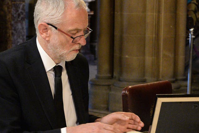 Jeremy Corbyn signs a book of condolences in Manchester following the attack at an Ariana Grande concert