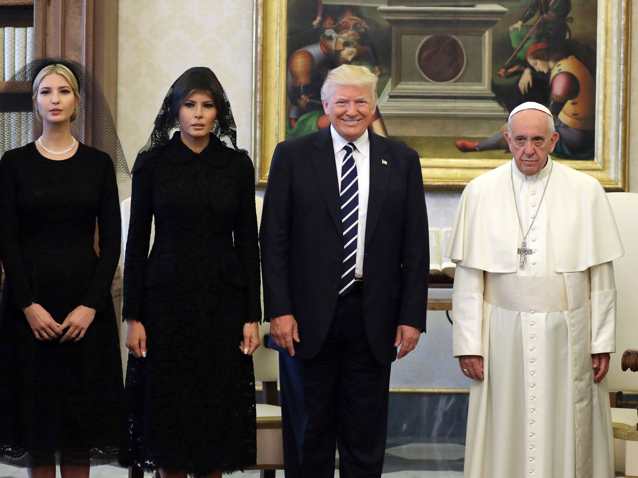Pope Francis poses with US President Donald Trump, First Lady Melania Trump and the daughter of Ivanka Trump at the end of a private audience at the Vatican