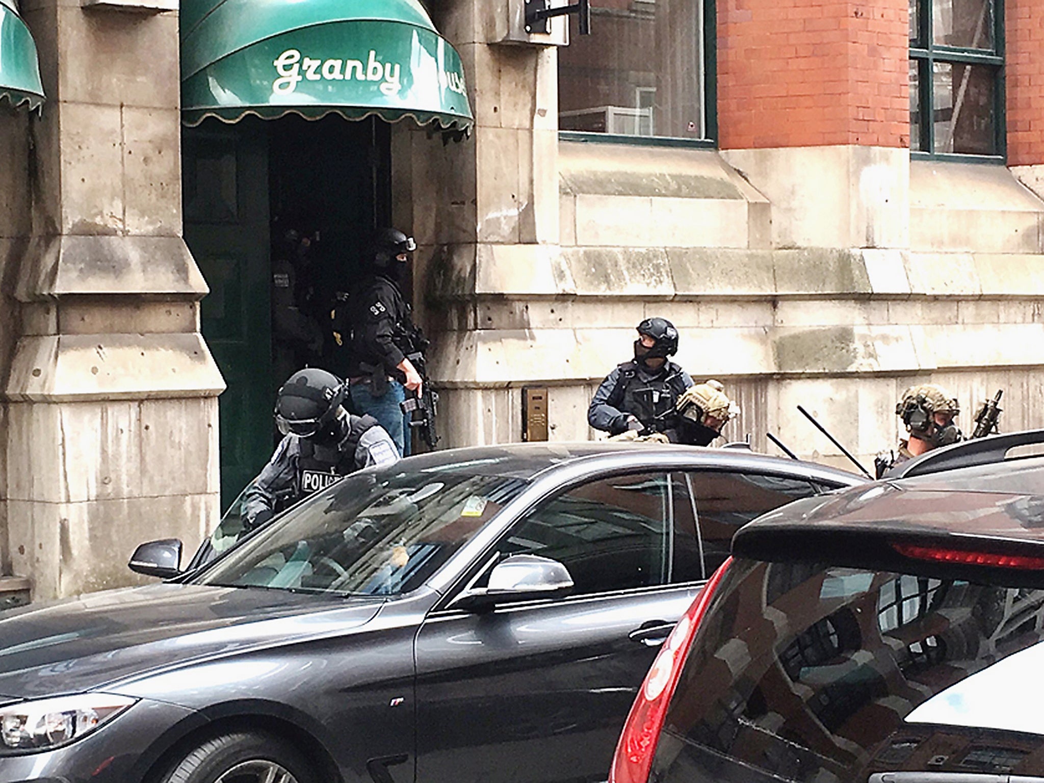 Police and army personnel raided the flat in Granby Row after using explosives to gain entry