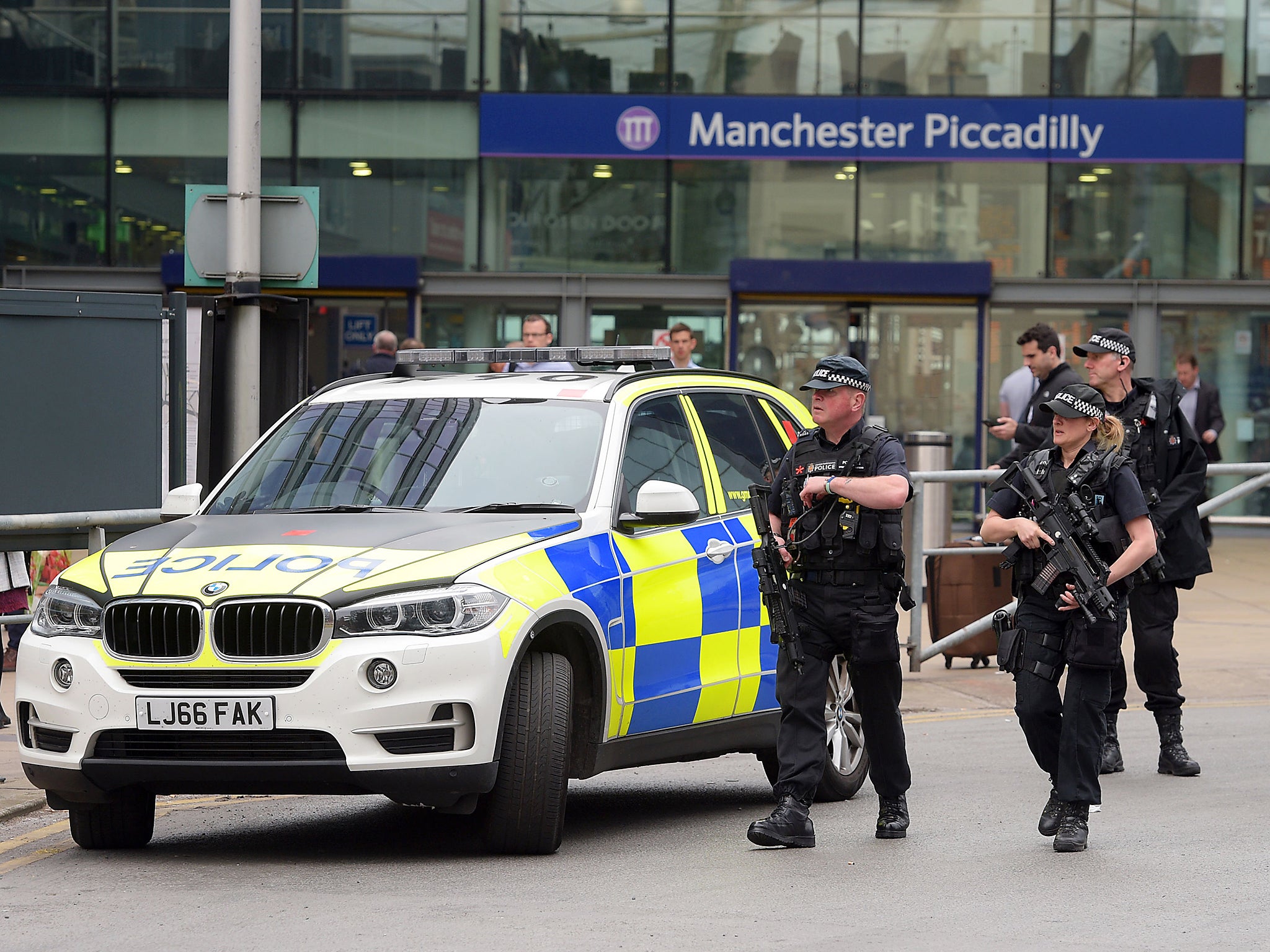 Armed police patrolling Manchester Piccadilly station following the suicide attack