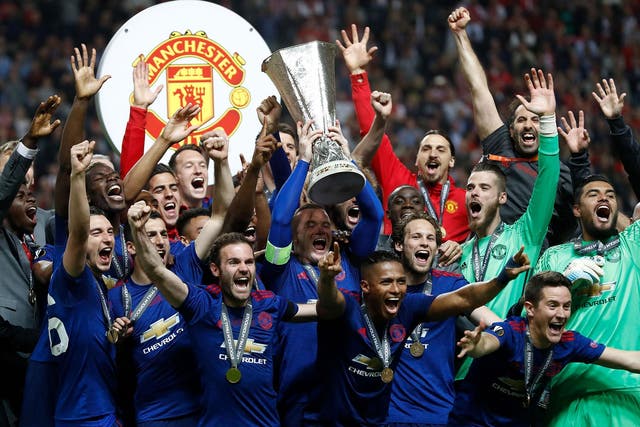 Wayne Rooney lifted the trophy on what is likely his last game for Manchester United