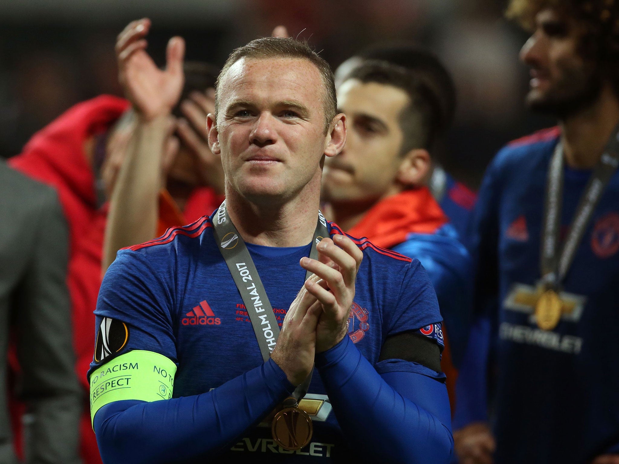 Wayne Rooney celebrates after the final at the Friends Arena