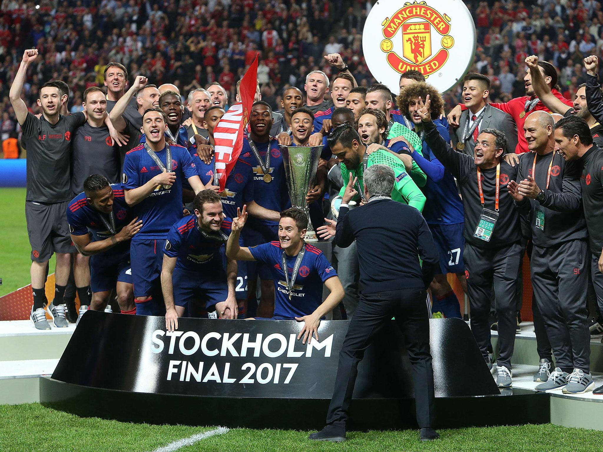Jose Mourinho tells his Manchester United players to display three fingers after winning the 'treble'