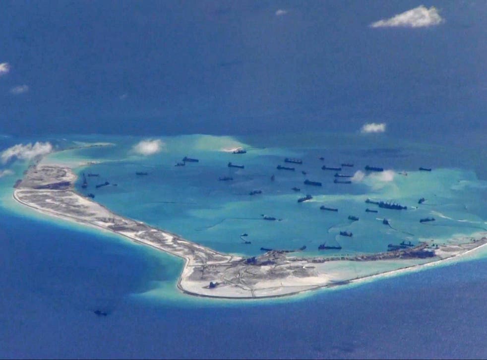 Chinese dredging vessels are purportedly seen in the waters around Mischief Reef in the disputed Spratly Islands in the South China Sea in 2015