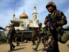 Isis militants kill 21 in rampage through Philippine city