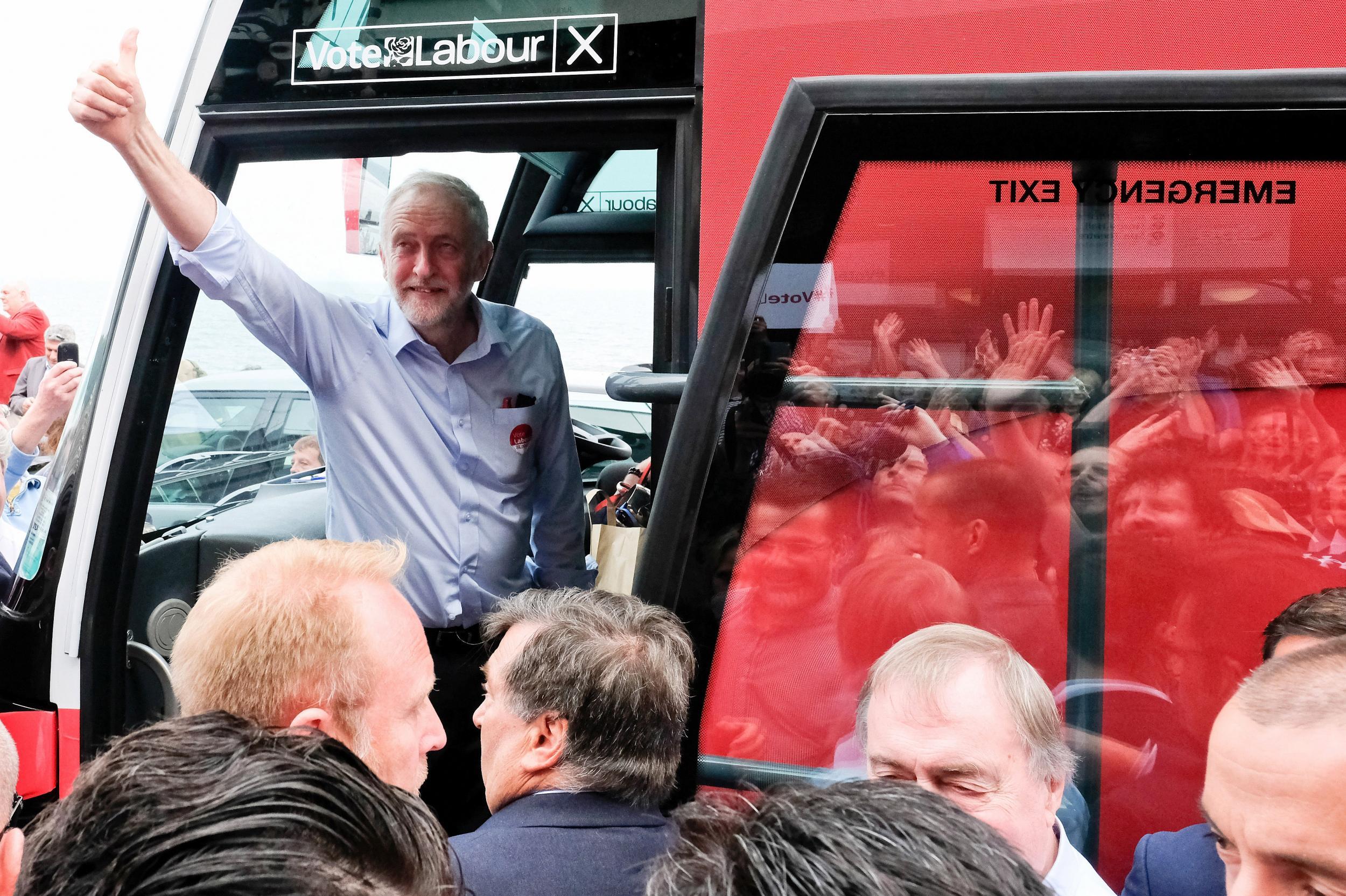 Labour Leader Jeremy Corbyn leaves on the campaign bus after speaking to supporters during a visit to the Spa buildings on Scarborough seafront