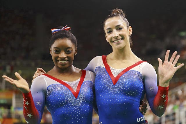 Aly Raisman (right) pictured with fellow Team USA gymnast Simone Biles at the Rio Olympics