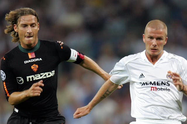 Beckham and Totti playing against one another in 2004