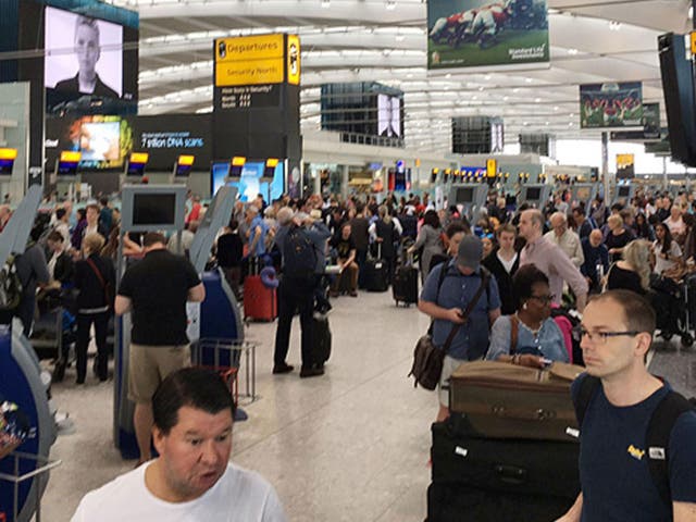 Passenger's photo of the British Airways check in desks at Heathrow Airport, as the airline is 'experiencing a global system outage'
