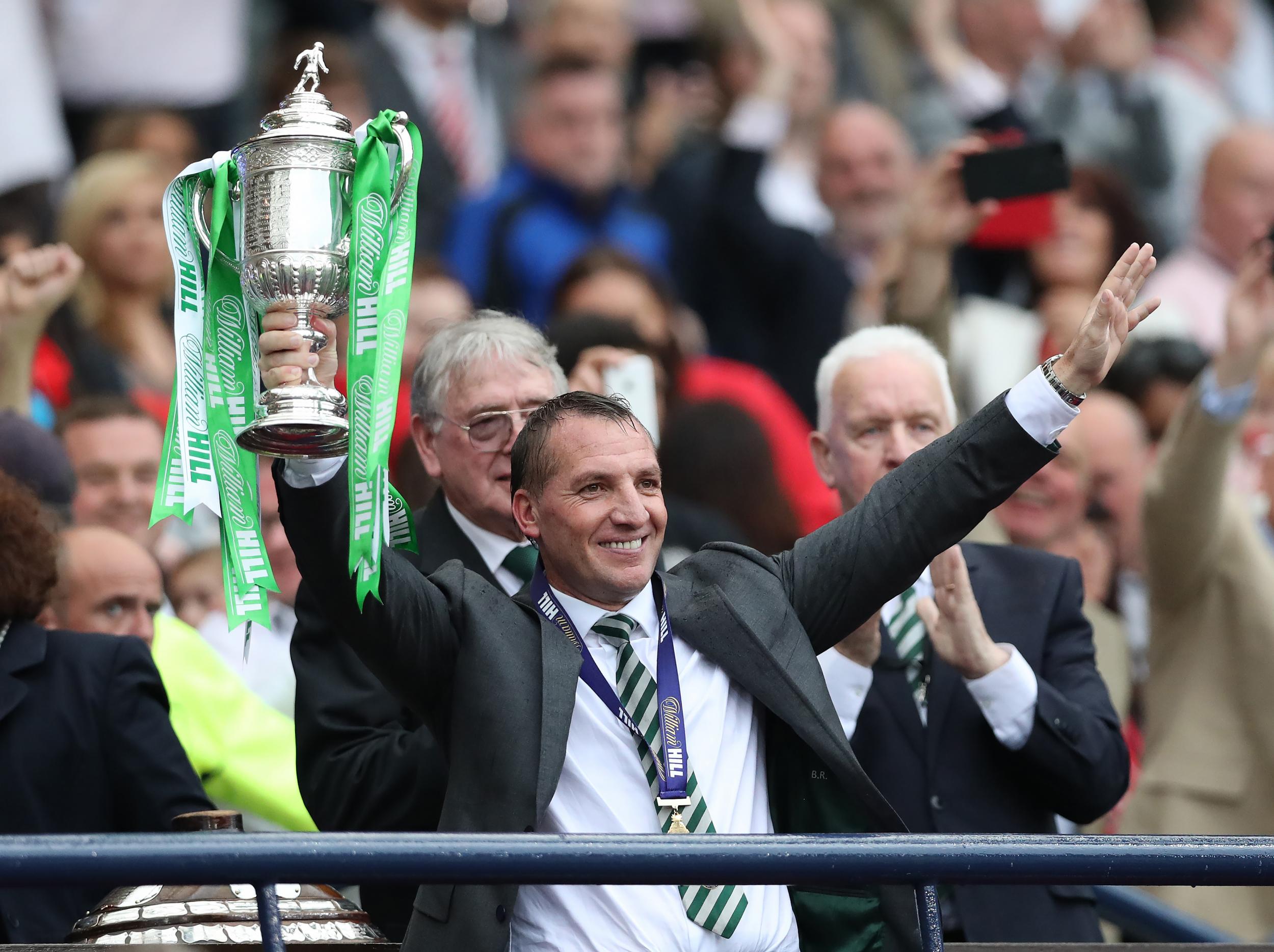 &#13;
Rodgers celebrates after Celtic's win&#13;