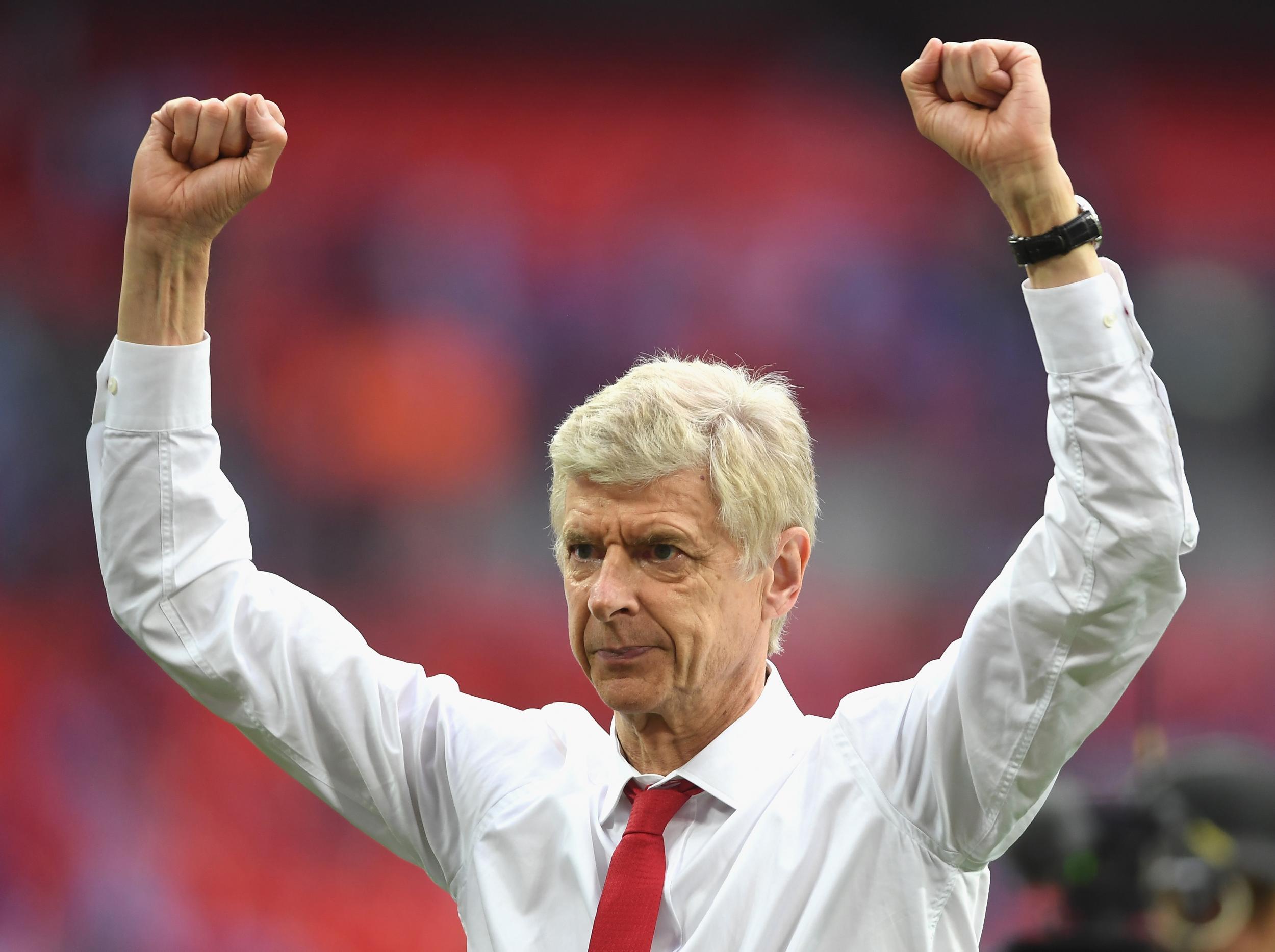Wenger celebrates at the end of the match
