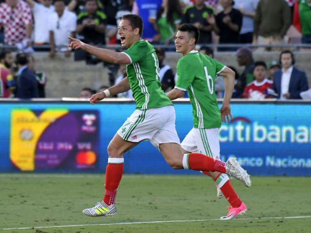 Javier Hernandez celebrates scoring his record 47th goal for Mexico in the 2-1 defeat by Croatia