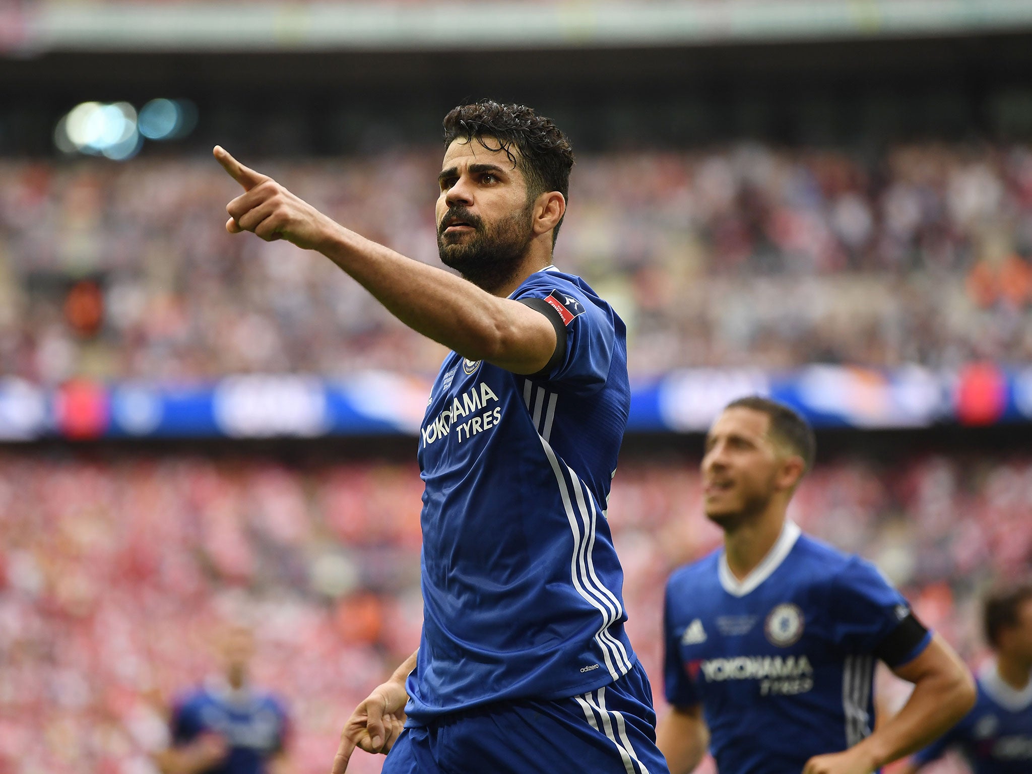 Diego Costa celebrates his equaliser against Arsenal
