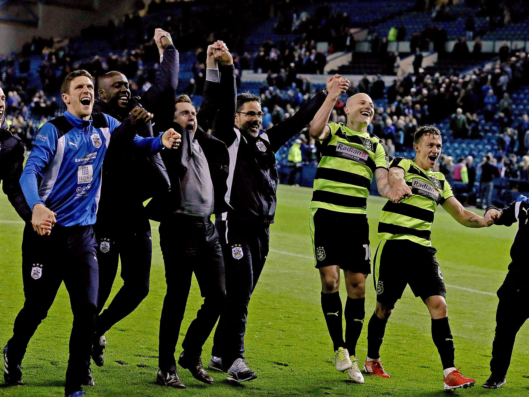 Huddersfield celebrate after their victory over Wednesday