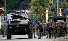 Isis-linked militants dump bodies of civilians in Philippines rampage