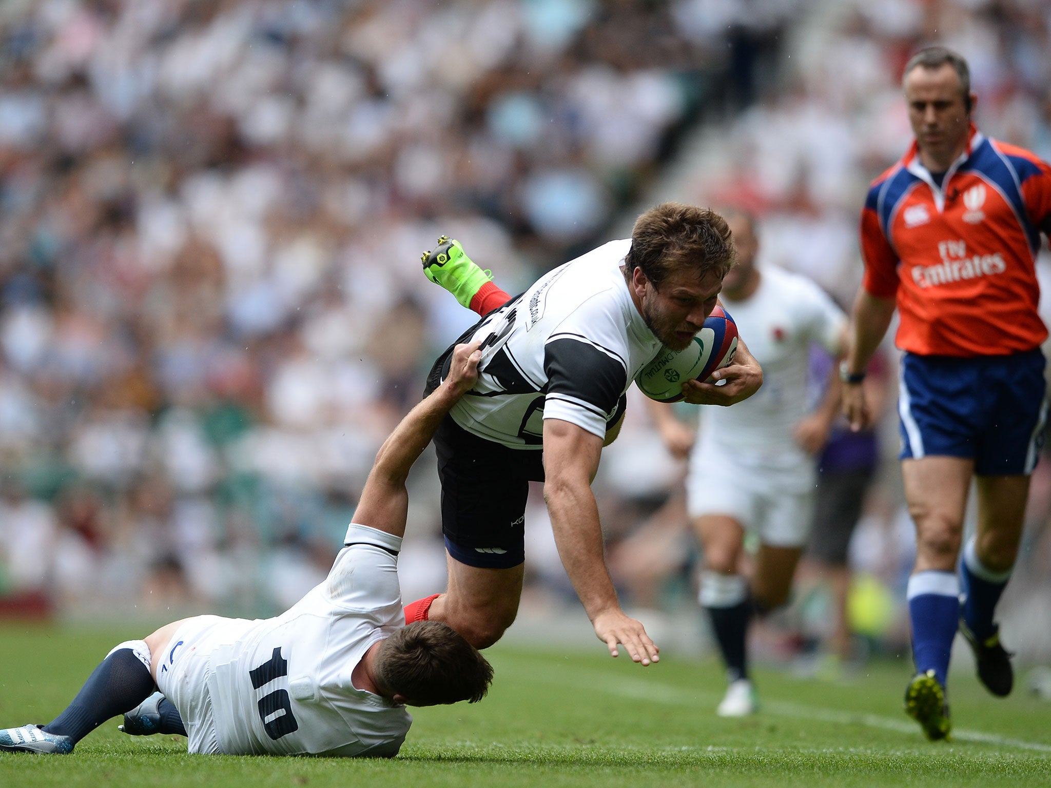 Francois Steyn is brought down by George Ford