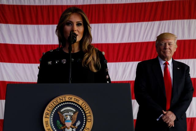 US First Lady Melania Trump introduces her husband President Donald Trump as he rallies with service members at Sigonella Air Force Base at Naval Air Station in Italy