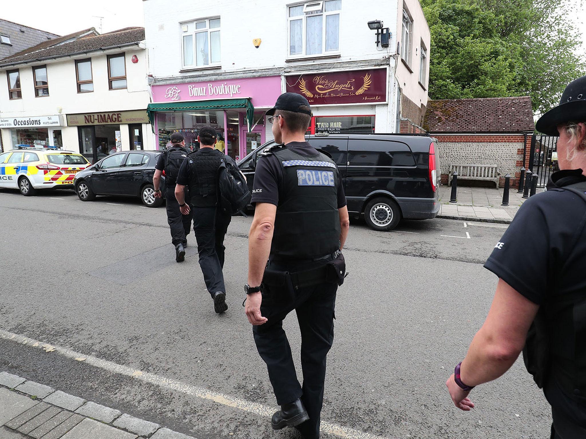 Police arrive at a property in Brunswick Road, Shoreham-by-Sea, exactly a week since the Manchester Arena terror attack took place