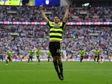 Huddersfield beat Reading on penalties to secure Premier League status