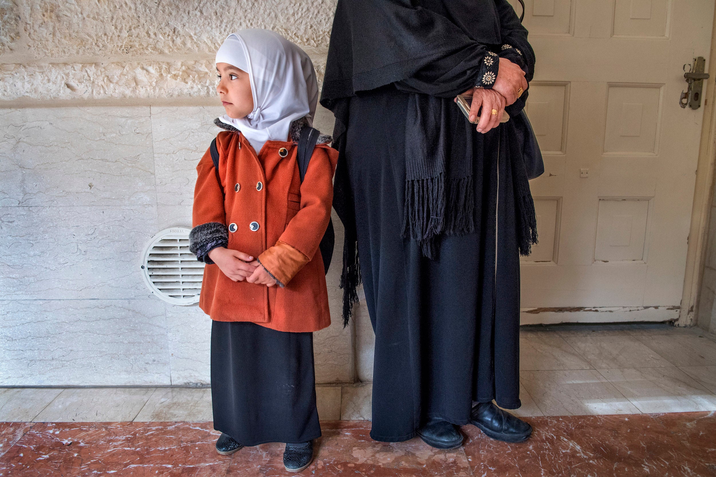 Patience: a child and her grandmother outside a cancer ward – Israel does not regard old and young visitors as so much of a security threat