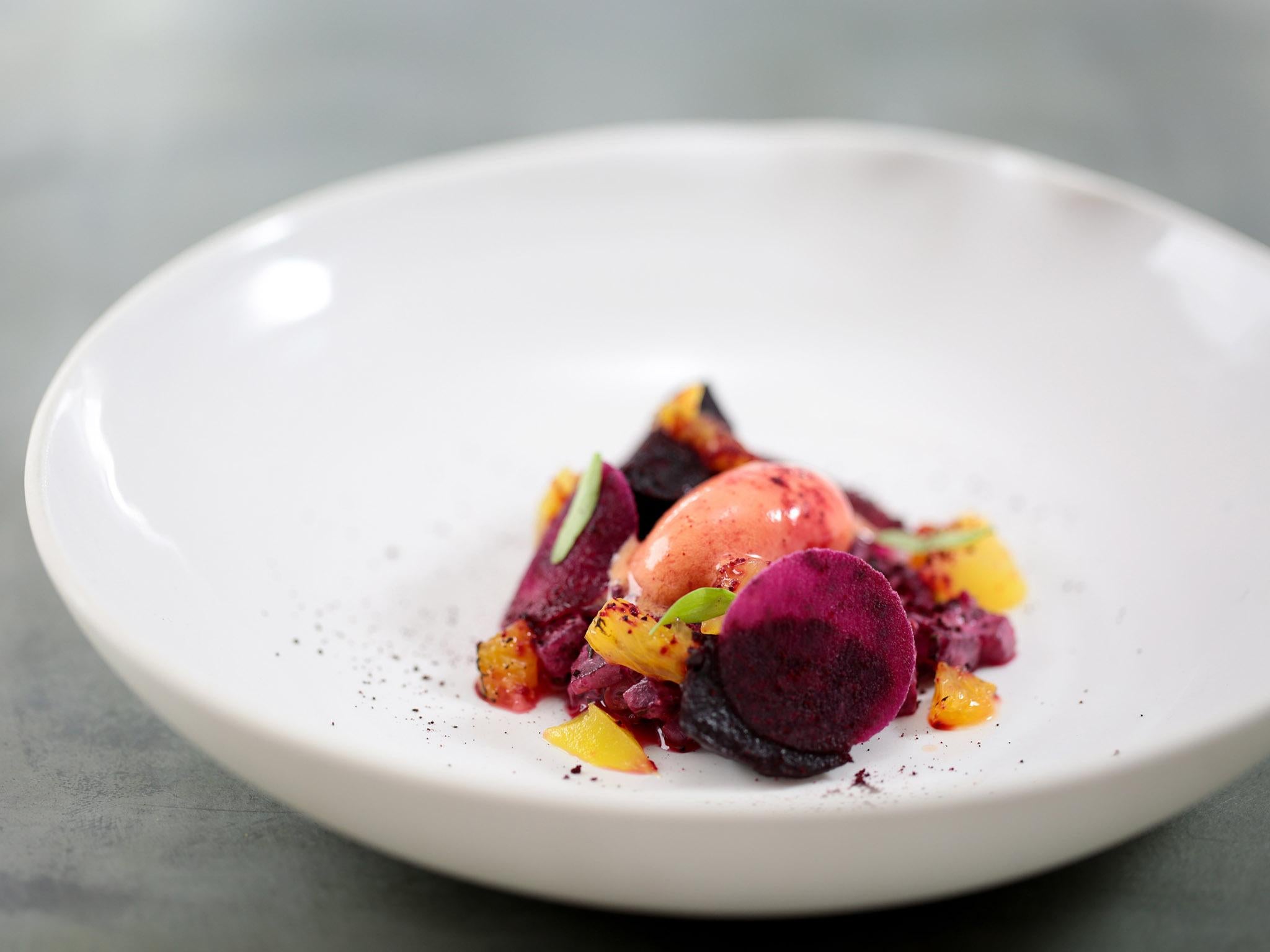 Beetroot tartare: pickled beetroot, roasted baby beetroot, beetroot powder, blow-torched orange segments, blood orange sorbet, and coriander