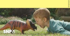 The SNP manifesto shows a young boy being impaled by a dinosaur