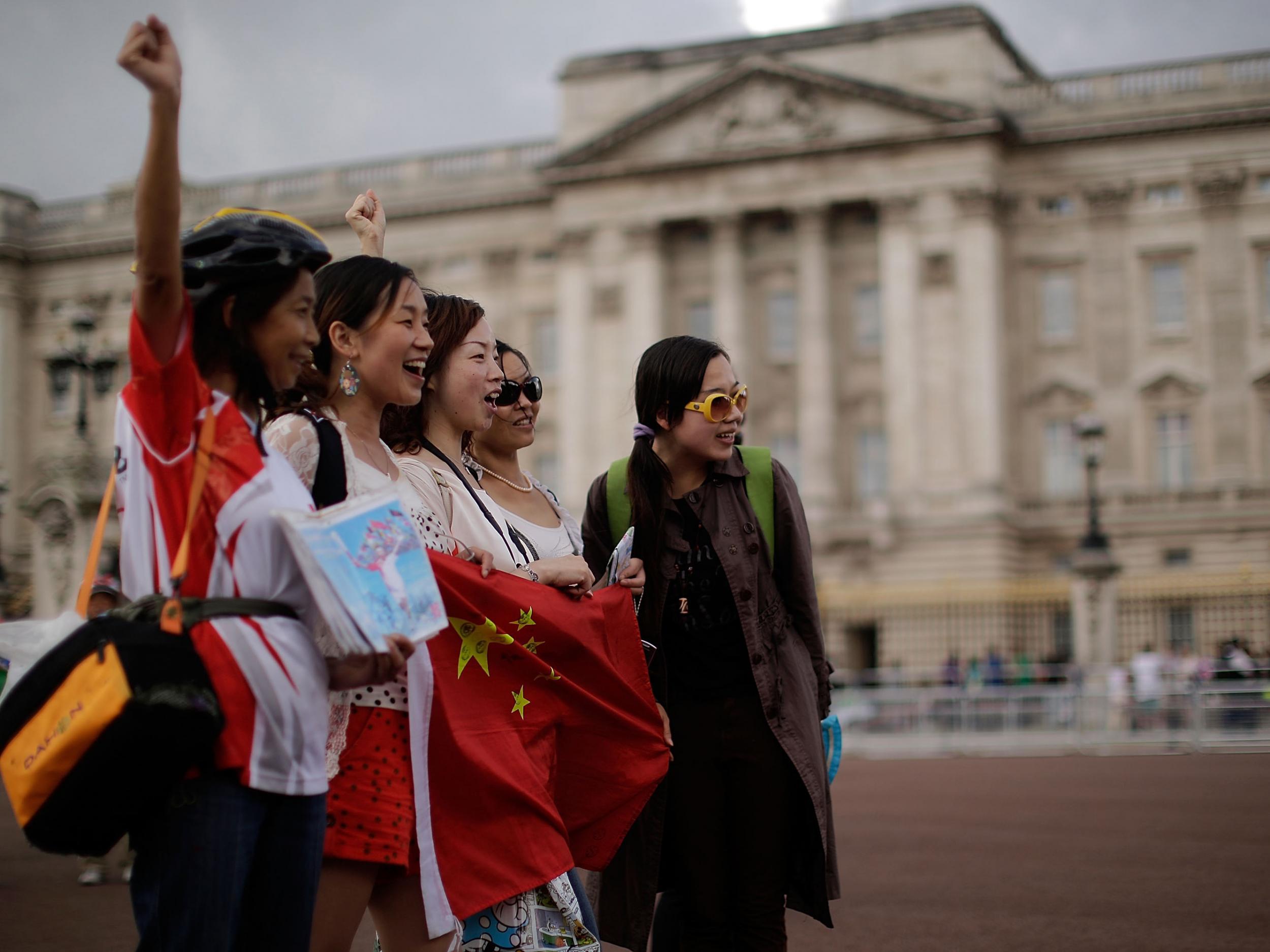 Chinese tourists outside Buckingham Palace. Visitors from the People's Republic made up 2.7 per cent of total tourism spending in the UK in 2014