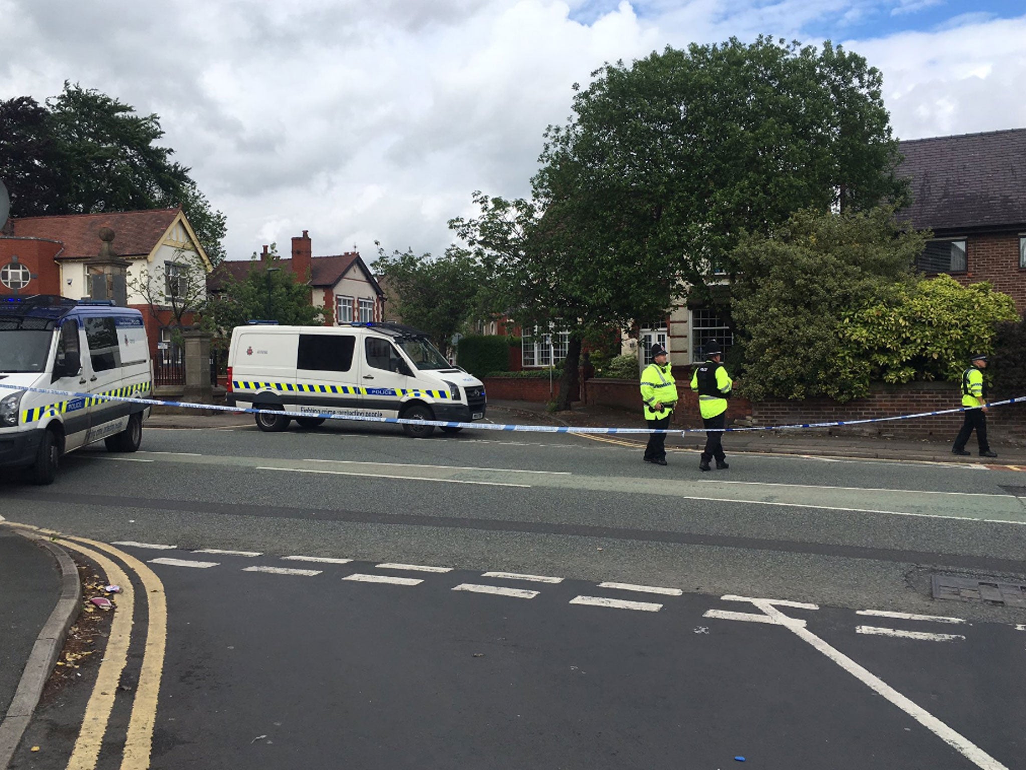 Police put a cordon in place after bomb disposal officers were deployed to a street in Wigan
