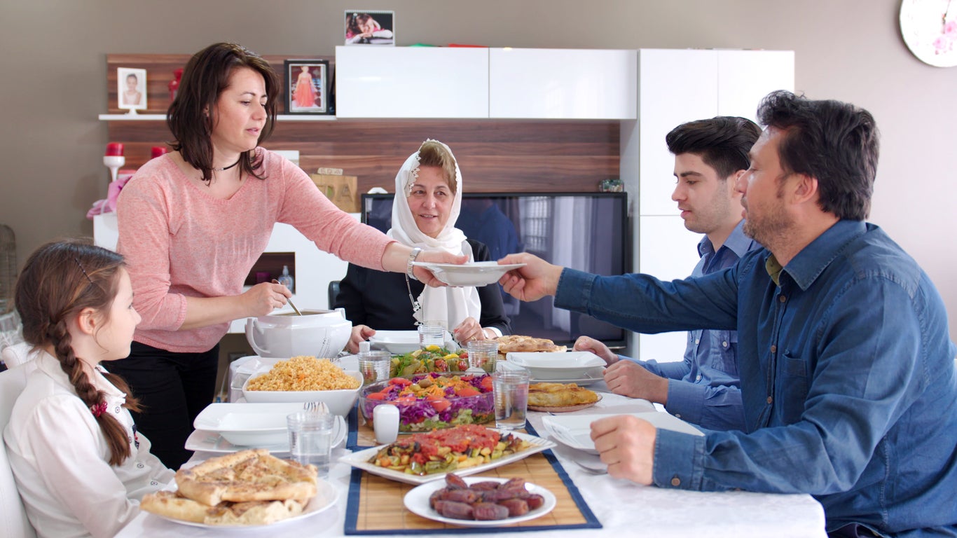 Many people see the month as a chance to reconnect with friends and family (Getty)