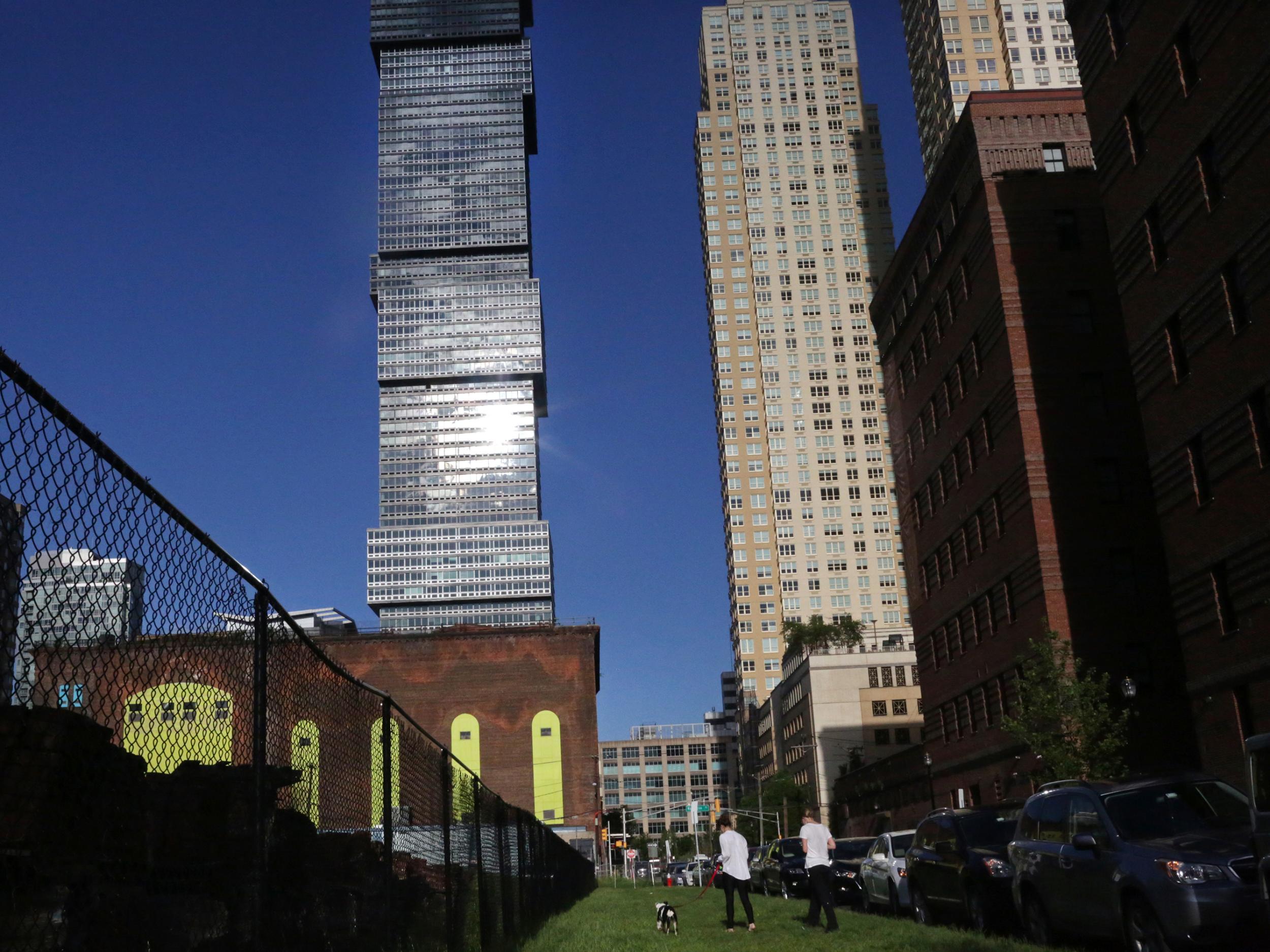 The developers of 65 Bay St. in Jersey City, the tower on the right, used an investor visa program to obtain $50 million in low-cost financing