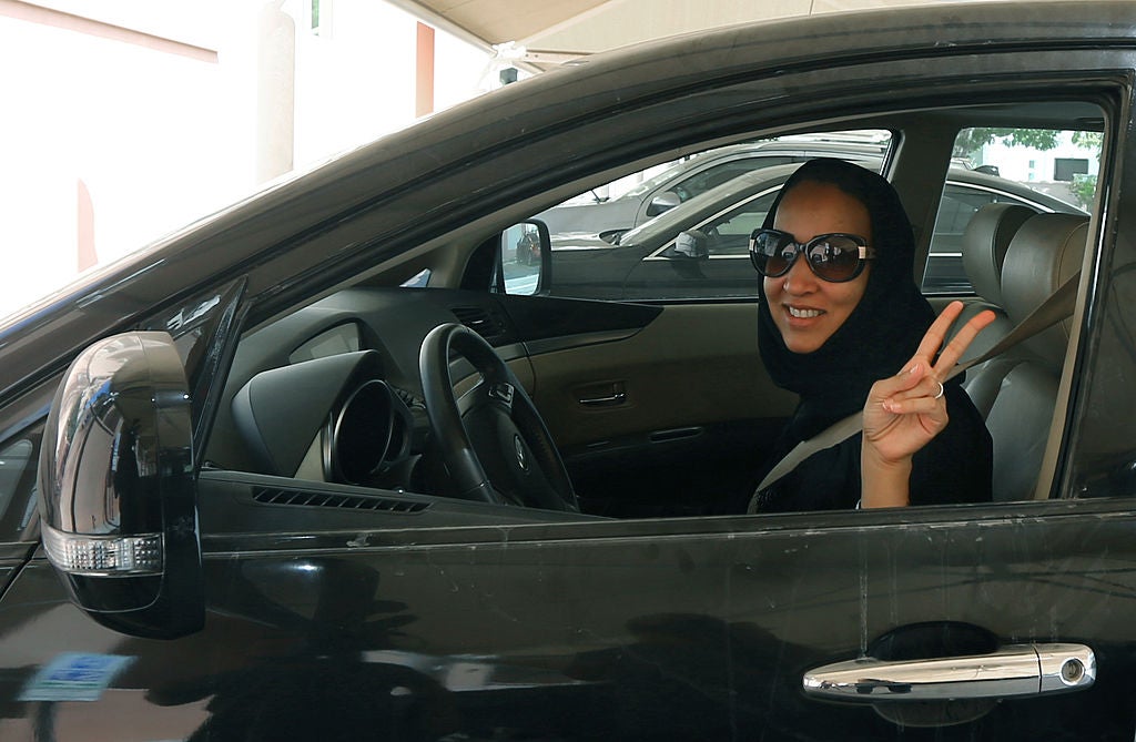 Saudi activist Manal Al Sharif drives her car in the UAE state of Dubai in an act of solidarity with protests against the ban in Saudi Arabia