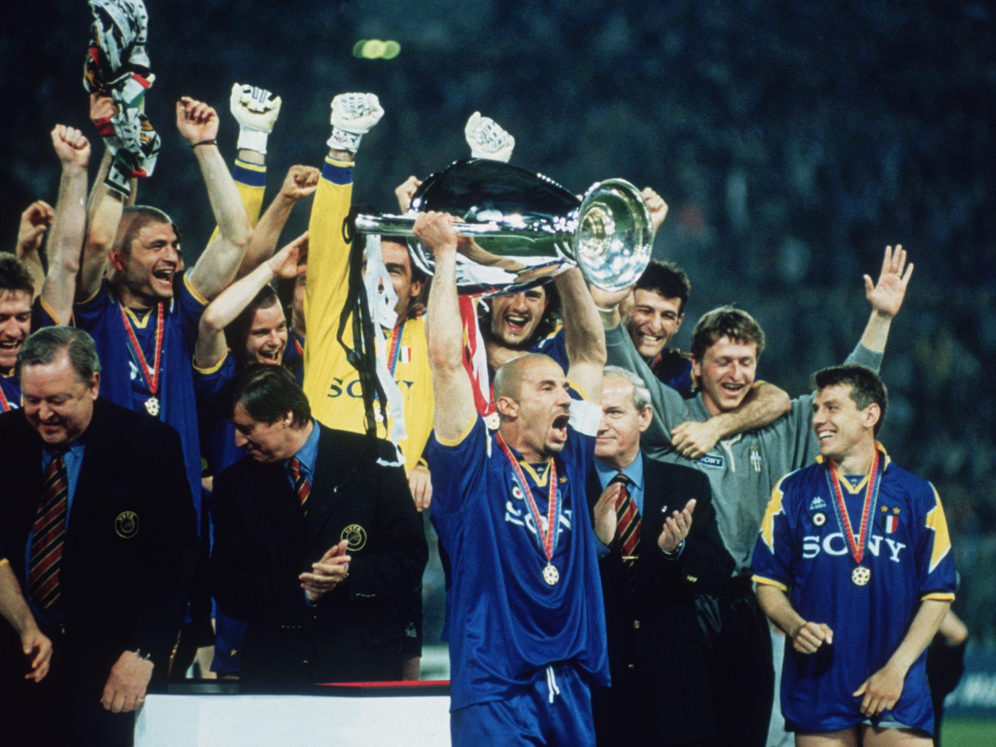 Juventus captain Gianluca Vialli lifts the trophy after his side beat Ajax on penalties