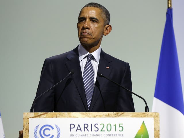 Barack Obama participating in the climate summit in Paris in 2015