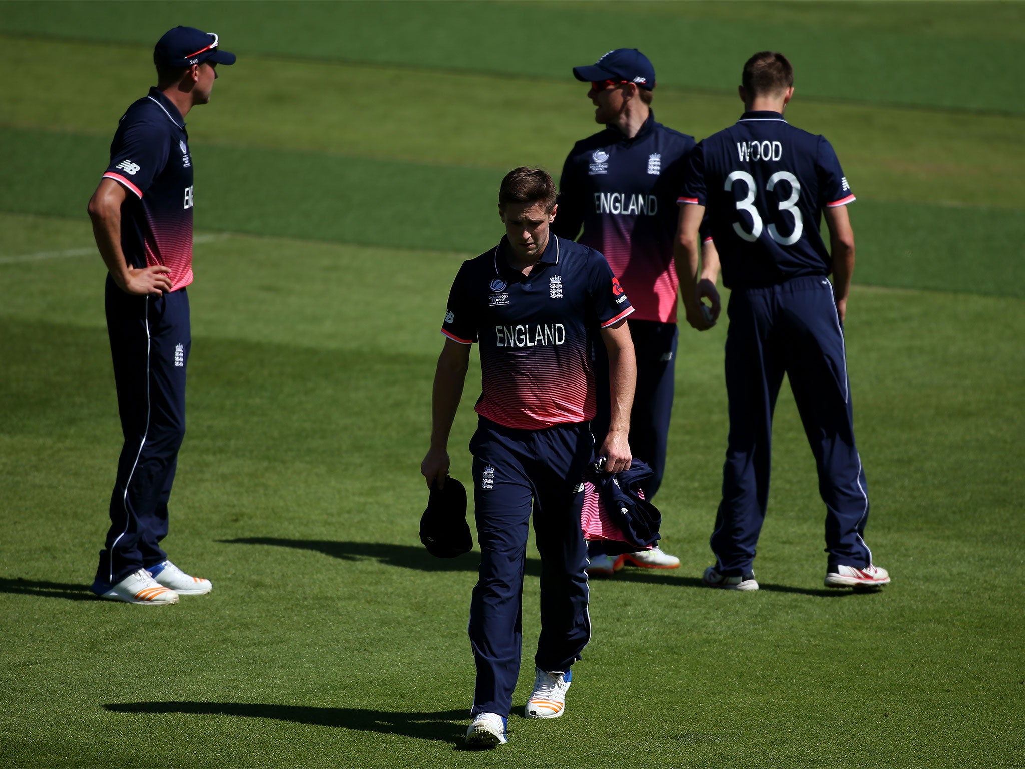 Chris Woakes trudges off with injury