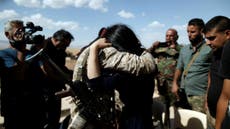 Yazidi activist cries on return to her village for first time 