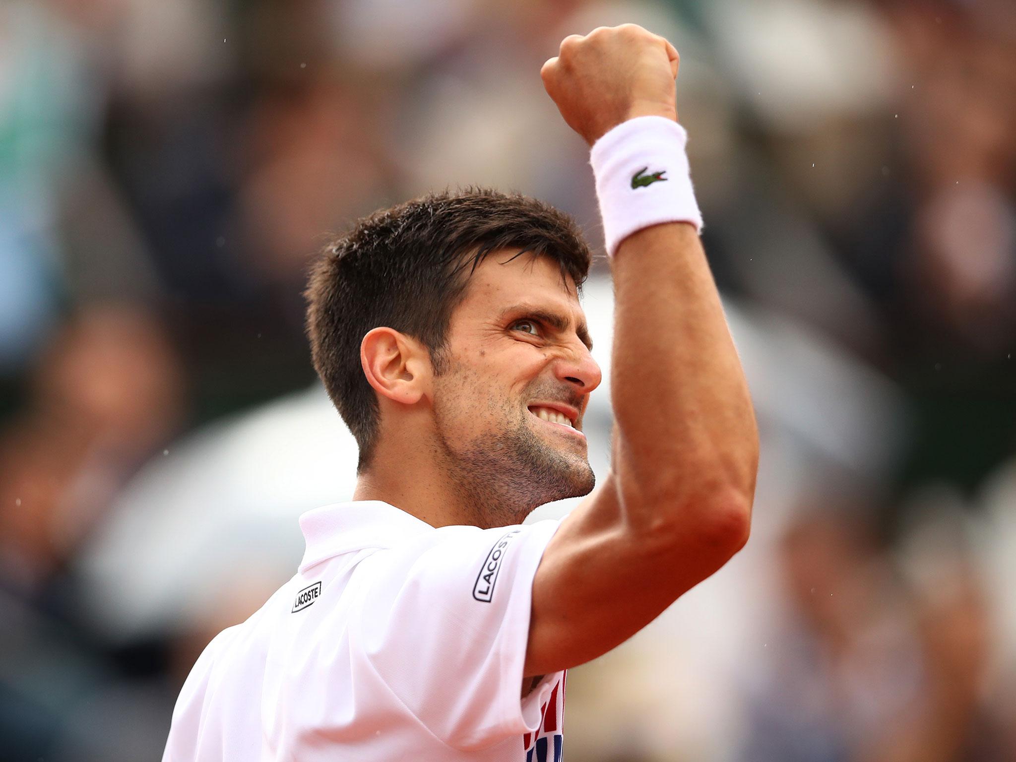 Novak Djokovic celebrates after finally seeing off the Argentine
