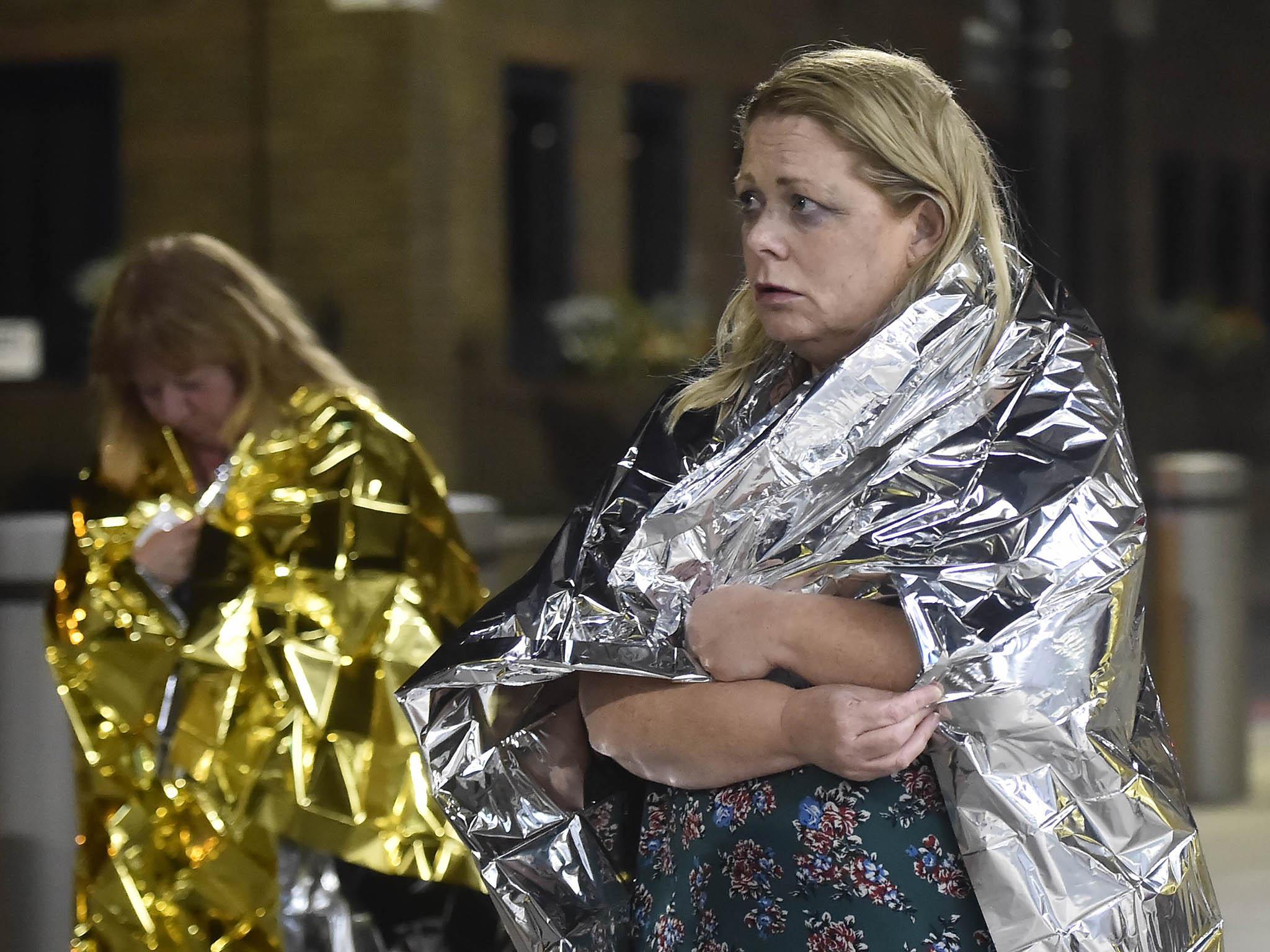 Witnesses and victims being led away from the scene at London Bridge