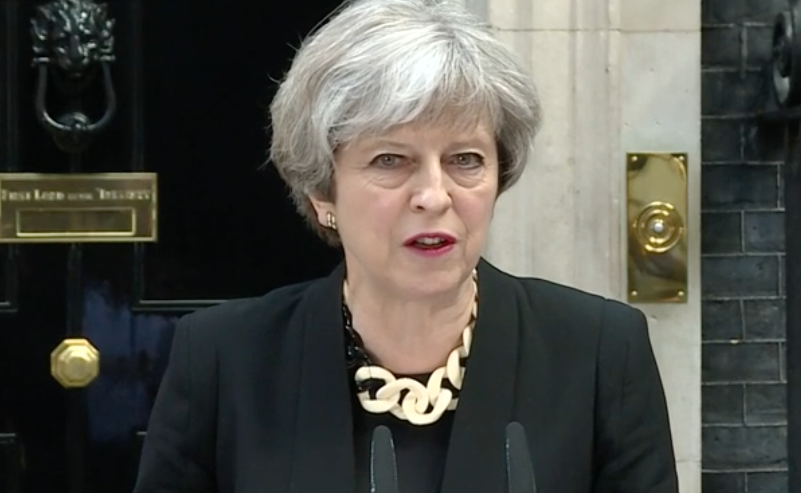 Theresa May makes a statement outside Downing Street following the attack