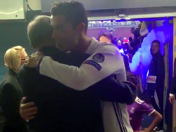 Ronaldo embraces his former manager after the full-time whistle