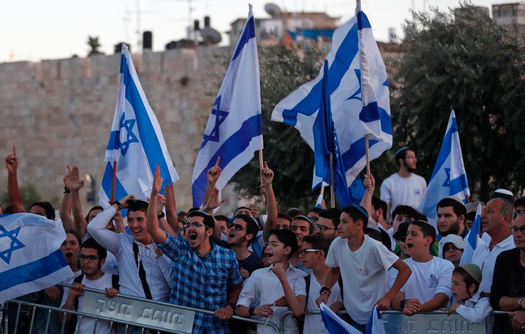 Far-right Israeli nationalists fly the Israeli flag in Jerusalem’s Old City on Jerusalem Day last month (AFP/Getty)